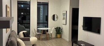 Spacious 2BR + Sofa Bed | Walk to Laurier & Uptown | Free Parking