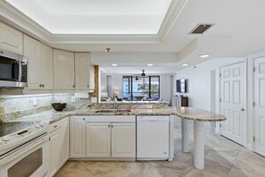 Fridge, microwave, oven, stovetop - 2 Bedroom Beachfront Condo by FVC (Longboat Key)