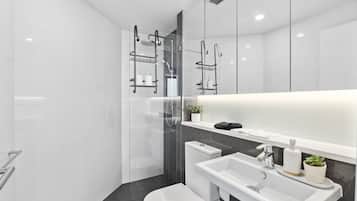 Shower, hair dryer, towels