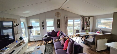 New south facing lodge, amazing sea views, town amenities and beaches nearby.