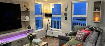 New south facing lodge, amazing sea views, town amenities and beaches nearby.