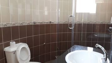 Deluxe Double Room | Bathroom | Shower, slippers, towels, soap