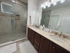 Shower, hair dryer, towels, soap - Coastal design newer condo amenity rich Artesia 20 minutes to Naples & beaches (Naples)