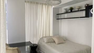 1 chambre, fer et planche Ă repasser, Wi-Fi, draps fournis