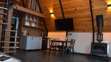 Bungalow – deluxe, hageutsikt | Spiseområde