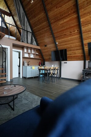 Deluxe bungalow, uitzicht op tuin | Interieur