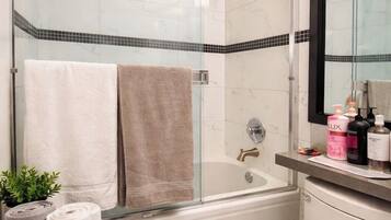 Hair dryer, towels, soap, shampoo