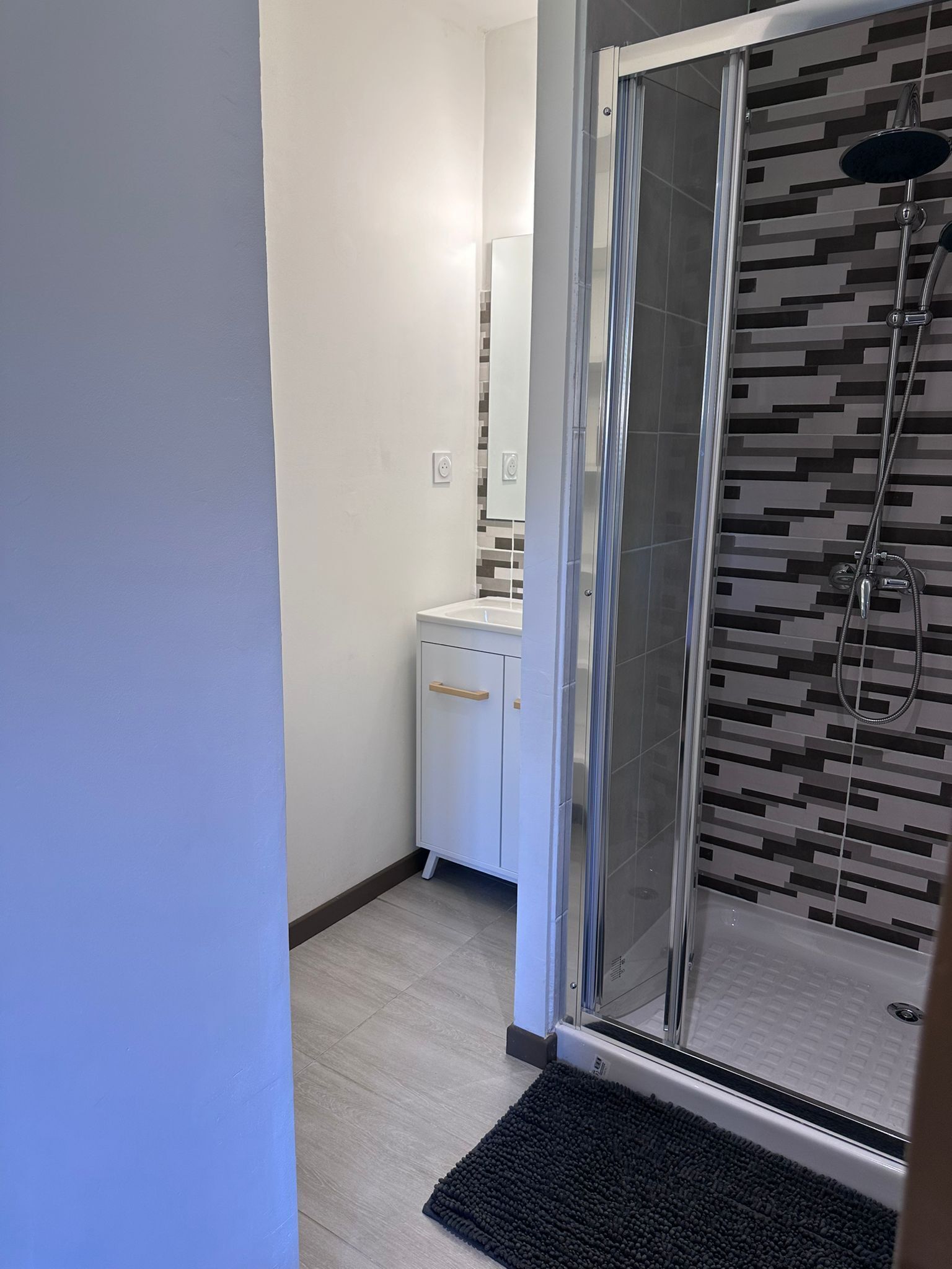 Shower, towels, soap, toilet paper