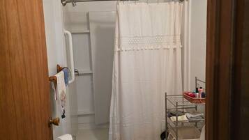 Shower, towels, soap, toilet paper