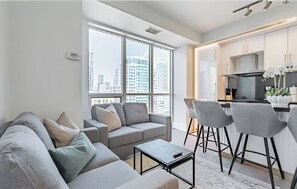 Family Suite, 3 Bedrooms, City View | Living area - The Casa - Toronto Financial District (Toronto)
