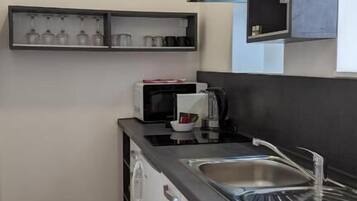 Studio Superior - uteplats - utsikt mot innergården | Eget kök