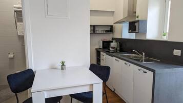 Studio Superior - uteplats - utsikt mot innergården | Eget kök