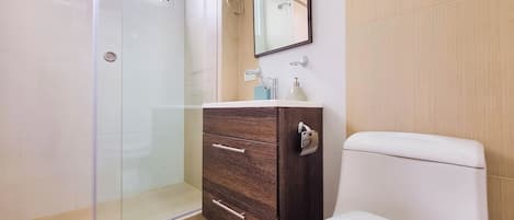 Shower, hair dryer, towels, soap