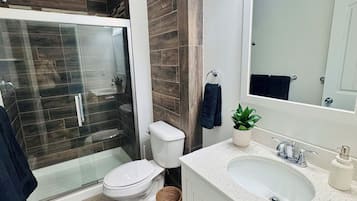 Shower, towels, soap, shampoo