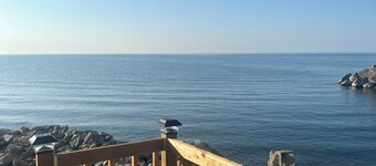 Wake up to the beautiful sunrise on Lake Erie in this tiny lakeside cabin.