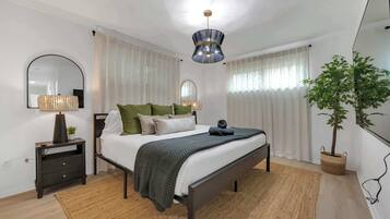 5 bedrooms, desk, iron/ironing board, travel cot