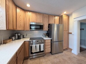 Private kitchen - "Oasis" Historic Beachside Cottage 3/2 – Steps to Sand! (Indian Rocks Beach)