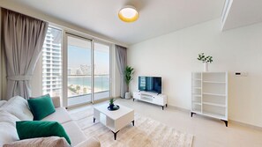 TV - Modern 1 Bed l Private Beach l Pool, Gym Access (Emaar Beachfront)