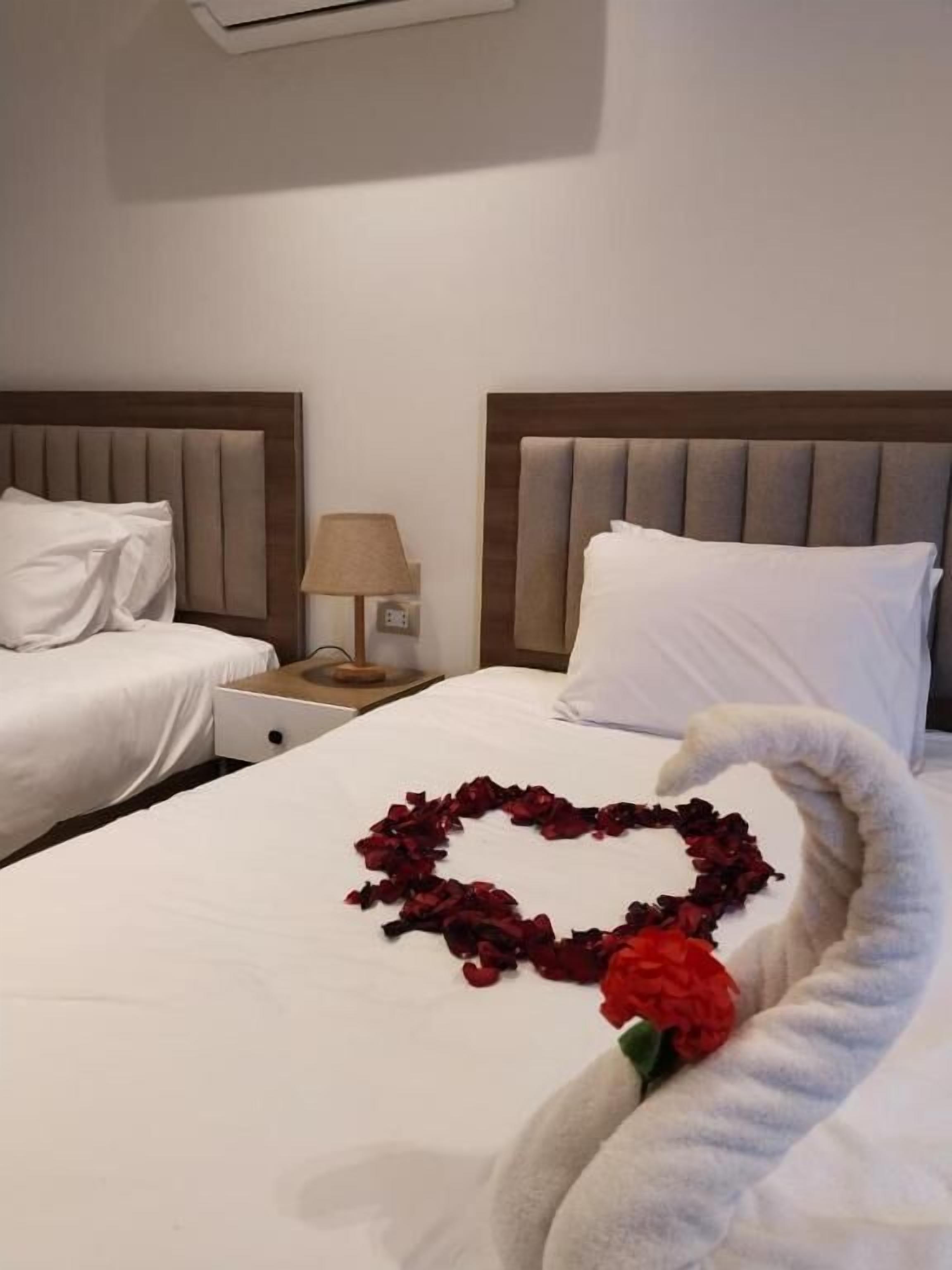 Deluxe Quadruple Room, City View