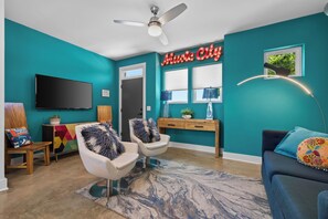 Open living space with TV, dining area, and bright modern finishes. - 1mi to Broadway! Cocktails & Dreams East Nashville (Nashville)