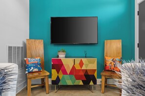 Playful geometric cabinet adds color and character to the living room. - 1mi to Broadway! Cocktails & Dreams East Nashville (Nashville)