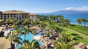 A resort with a large pool, palm trees, and a view of the ocean. - Westin Nanea Maui Luxurious 3Bedroom with OceanFront View - Jan 1-8, 2027 (Lahaina)