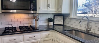 Charming 3-bedroom house in peaceful Overland Park with garage and yard!