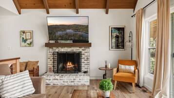 Smart TV, fireplace, table tennis, books