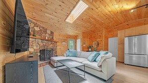 Living area - New to VRBO! Lakefront I Movie Theater I Putting Green I Game Room I Bocce ball! (White Haven)