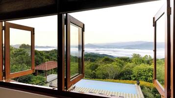 Quarto casal superior, vista para a montanha | Parte interna