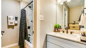 Hair dryer, towels, soap, toilet paper