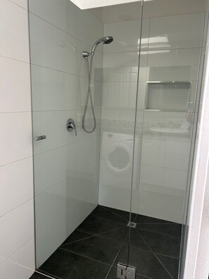 Shower, towels, soap, shampoo
