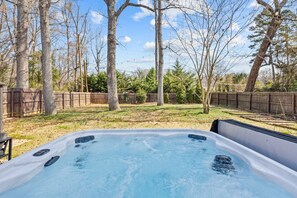 Outdoor spa tub - Spacious Charlotte Retreat with Private Hot Tub (Charlotte)