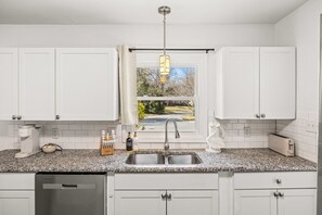 Private kitchen - Spacious Charlotte Retreat with Private Hot Tub (Charlotte)