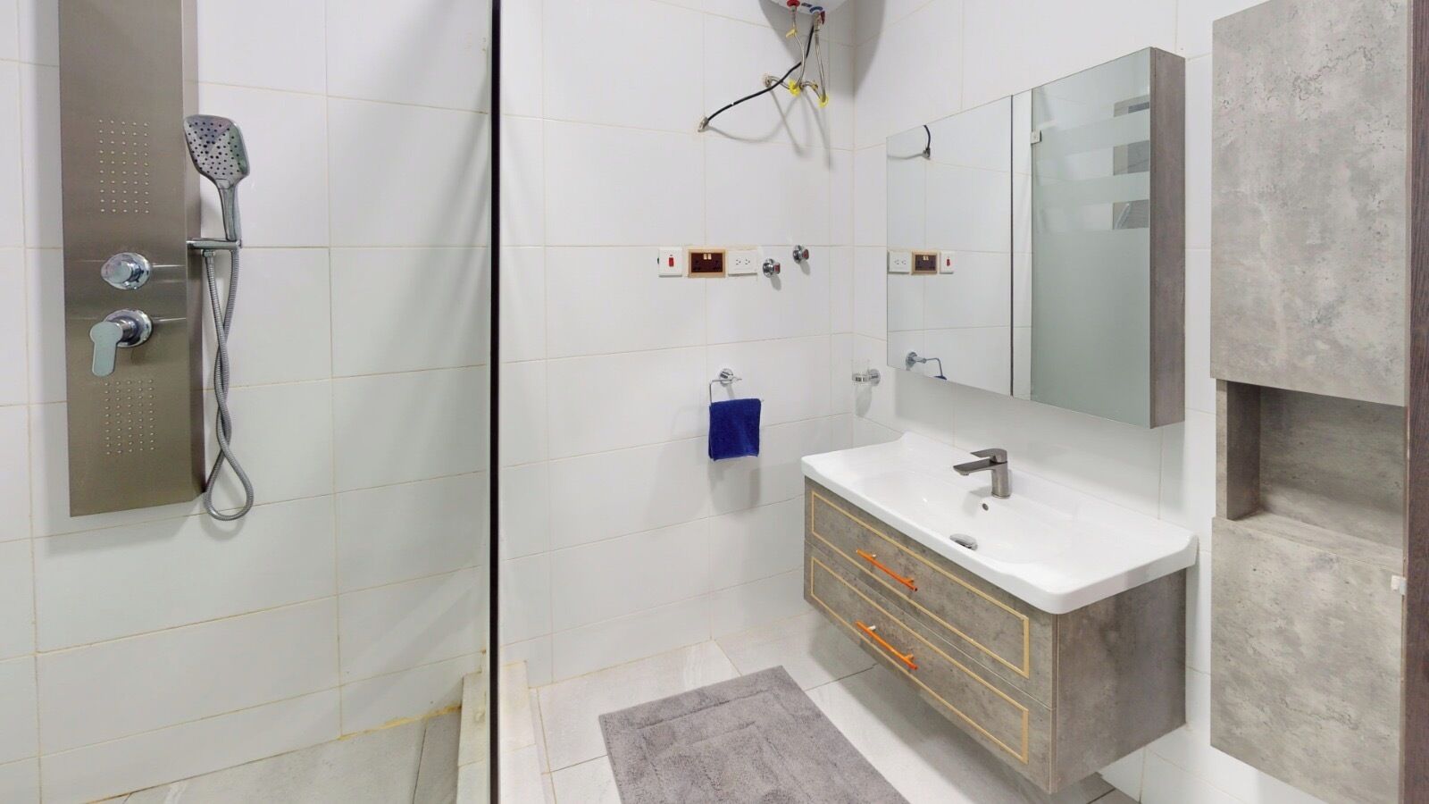 Shower, towels, toilet paper