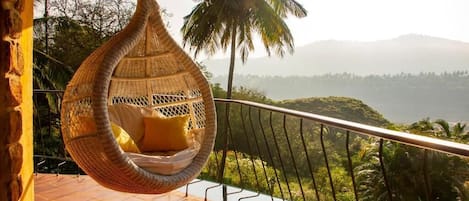 Family Suite, Balcony, Garden View | Property grounds