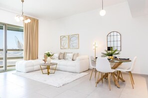 Apartment, Balcony, City View | Living area - Bloomfields 1Br Azure Stay Ajwan (Abu Dhabi)