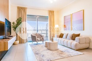 Apartment, Balcony, City View | Living area - Bloomfields 1Br Azure Stay Ajwan (Abu Dhabi)