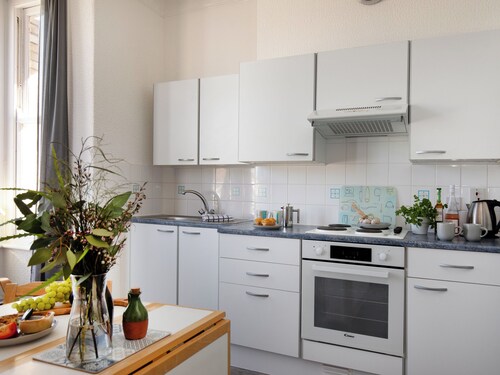 A comfortable first-floor apartment for two with lovely sea views.