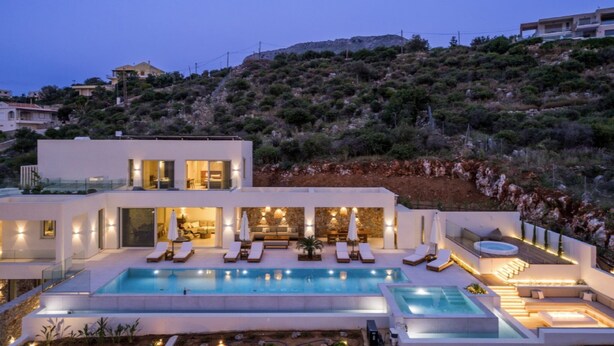 A modern villa with a swimming pool, outdoor seating, and a hillside view. - Villa Verdessa, Divine Sea Views, Private Infinity Pool, Furnished Terrace,. (Crete)