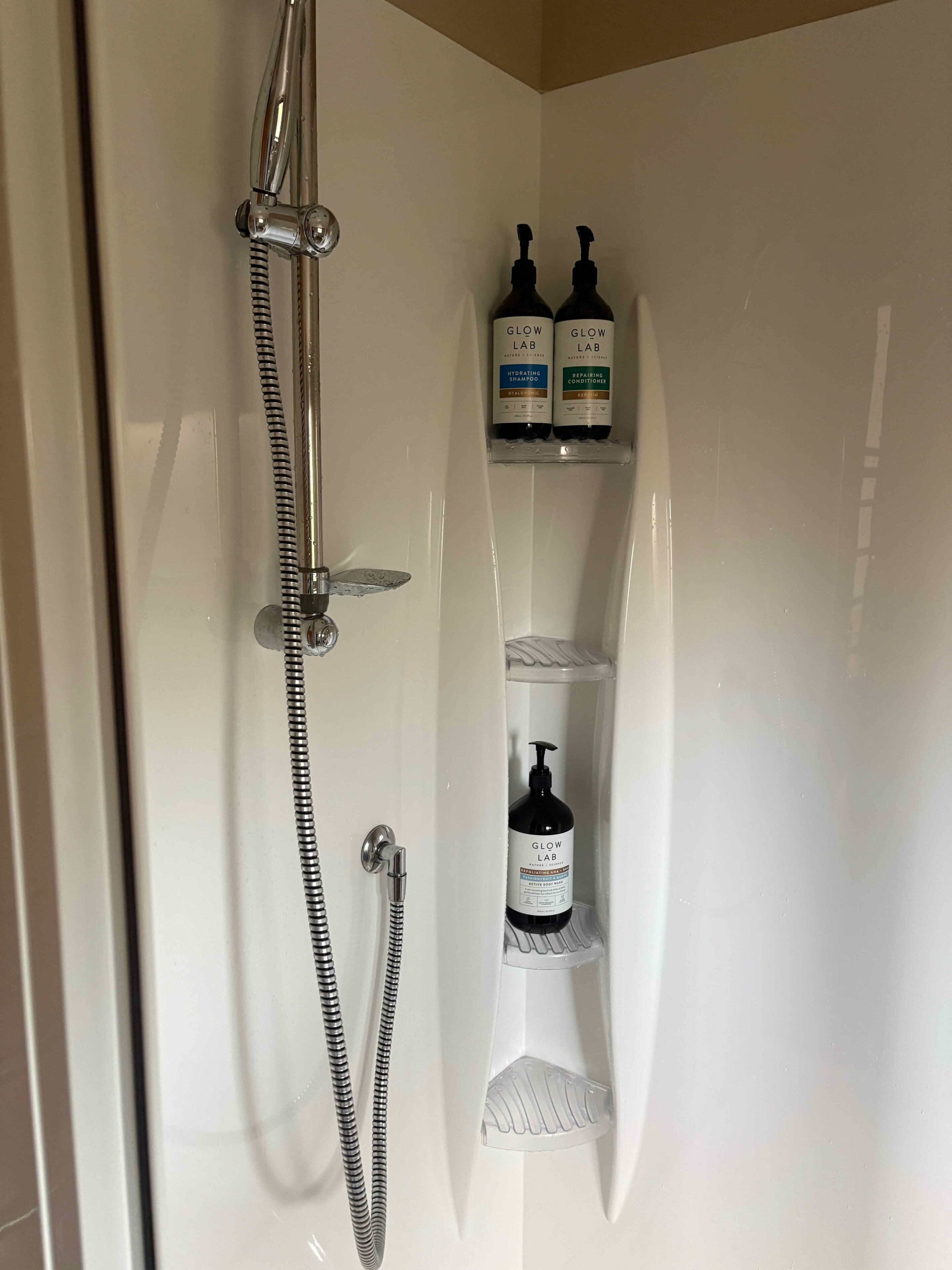 Shower, towels, toilet paper