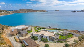 A coastal property with multiple buildings, a swimming pool, and a view of the sea. - Seafront Villa Solaryth, Divine Sea Views, Private Pool, Furnished Terrace,. (Crete)