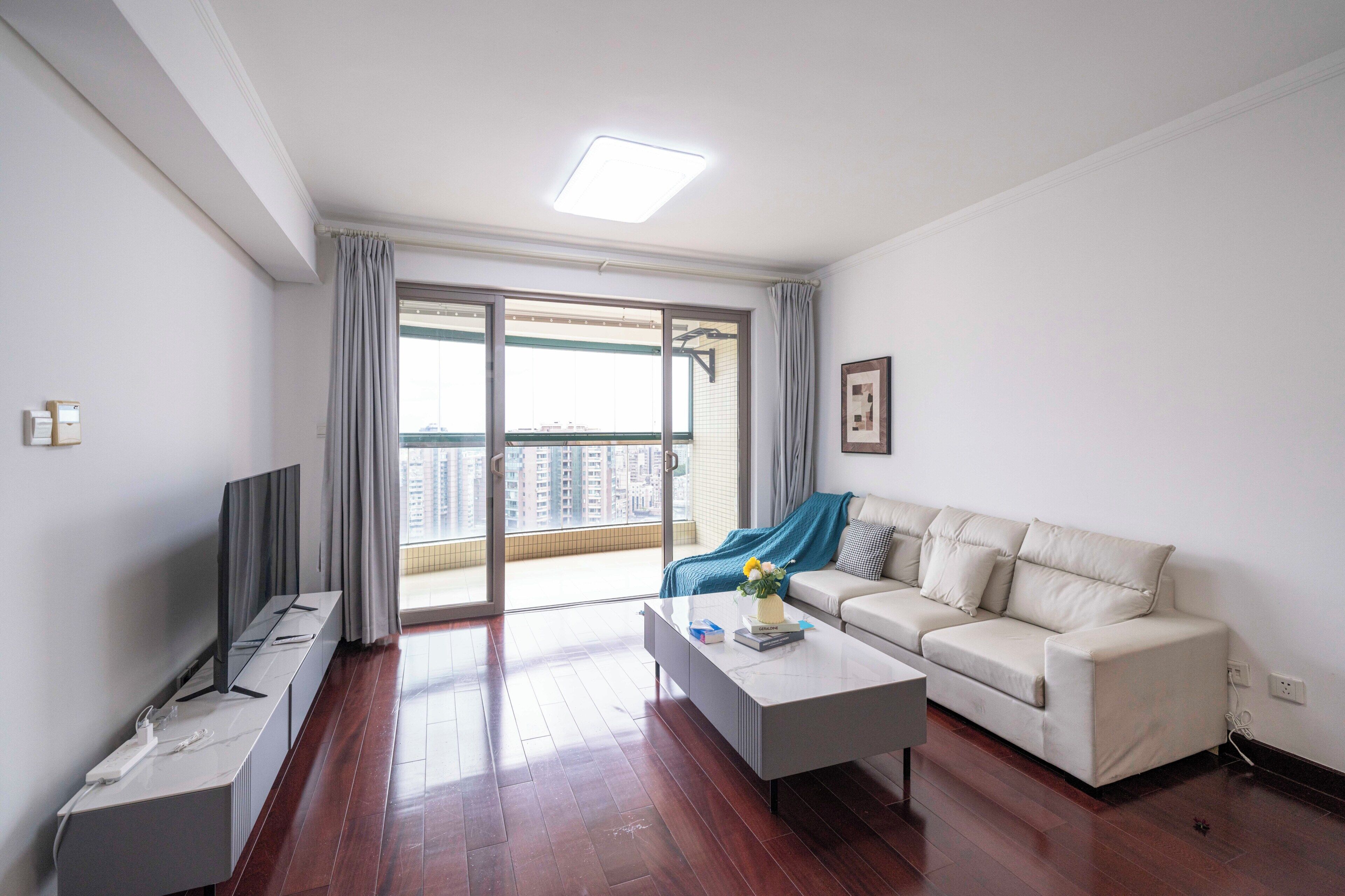 Superior Suite, Air conditioning, City View | Living area | 55-inch TV with cable channels