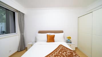 Family Suite, Multiple Beds | Premium bedding, down comforters, laptop workspace, blackout drapes