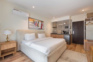 Single Room | Desk, laptop workspace, blackout drapes, iron/ironing board - Aima Apartments  (Lekki)