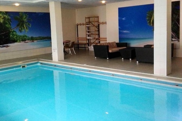 Dive into a serene indoor pool for year-round relaxation.