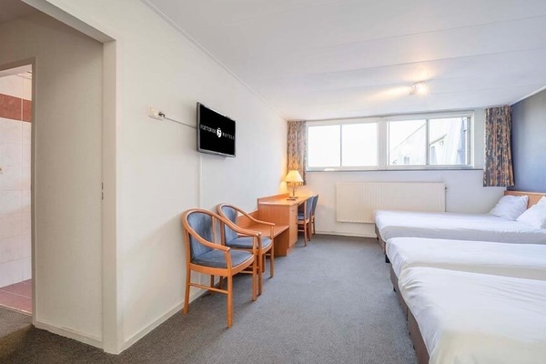 Settle in after exploring with comfy seating and TV.