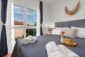 2 slaapkamers, een strijkplank/strijkijzer, gratis wifi, beddengoed