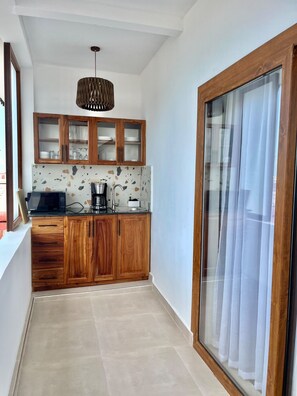 Apartamento, sacada, vista para o oceano | Cozinha privada