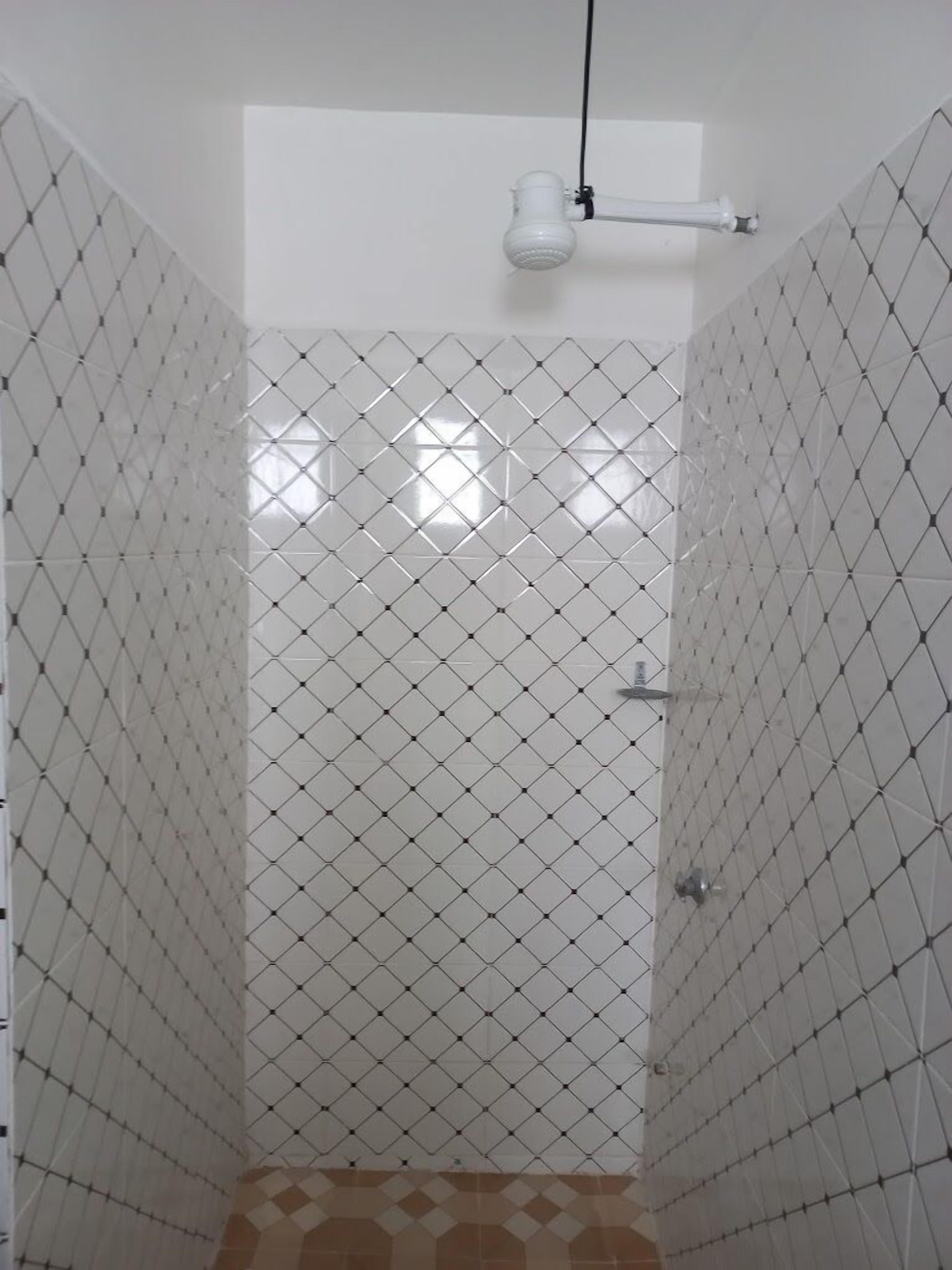 Deluxe Single Room | Bathroom | Shower, slippers, towels, soap